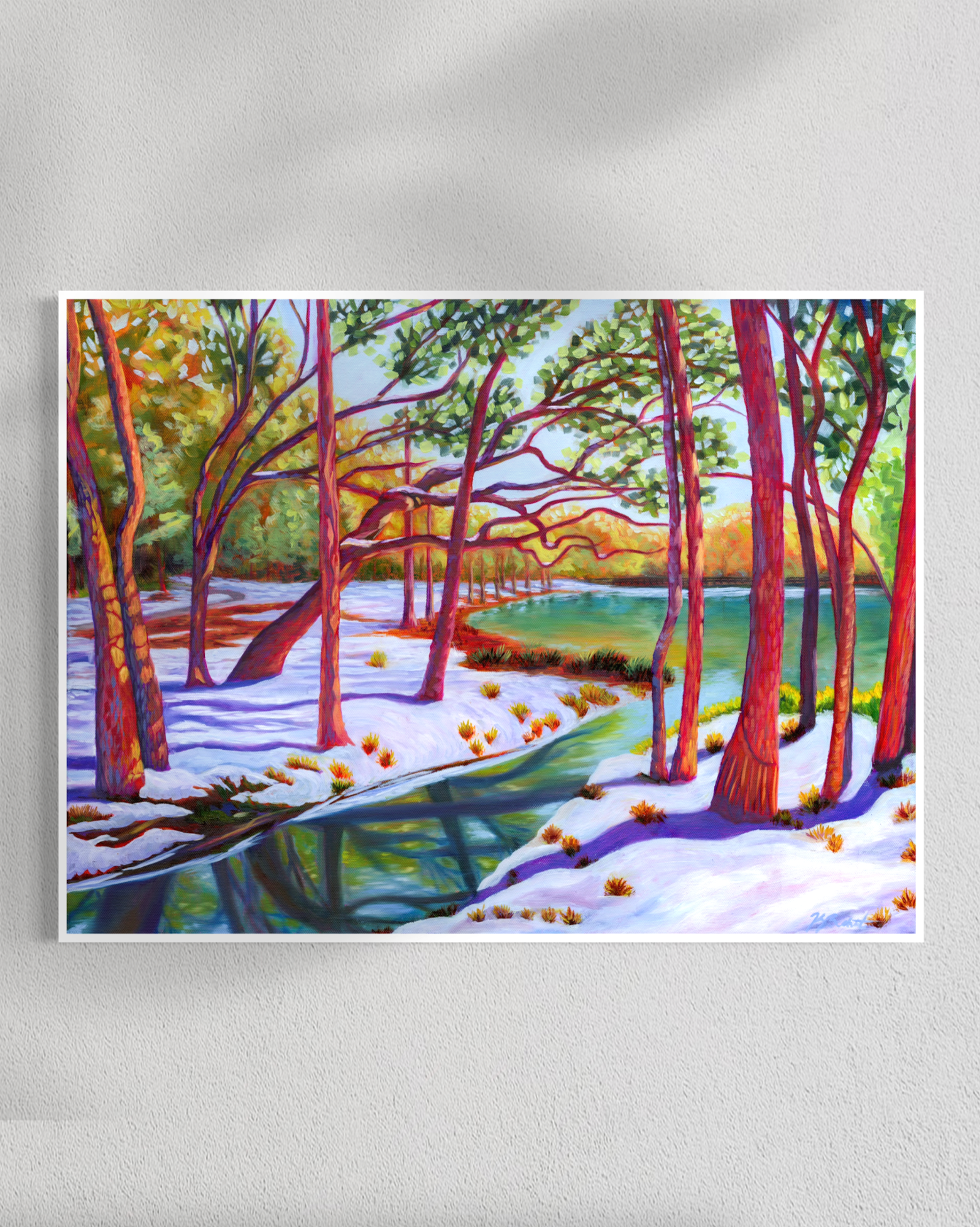 Colorful painting of a forest scene with trees and snow on a white wall.
