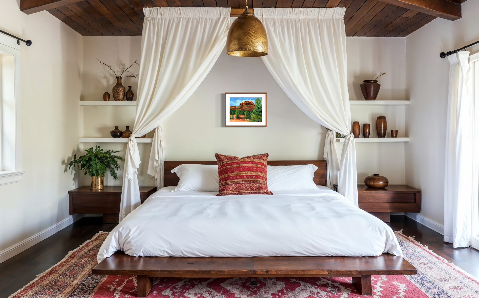 Bedroom with canopy bed, wooden headboard, and decorative pillows.