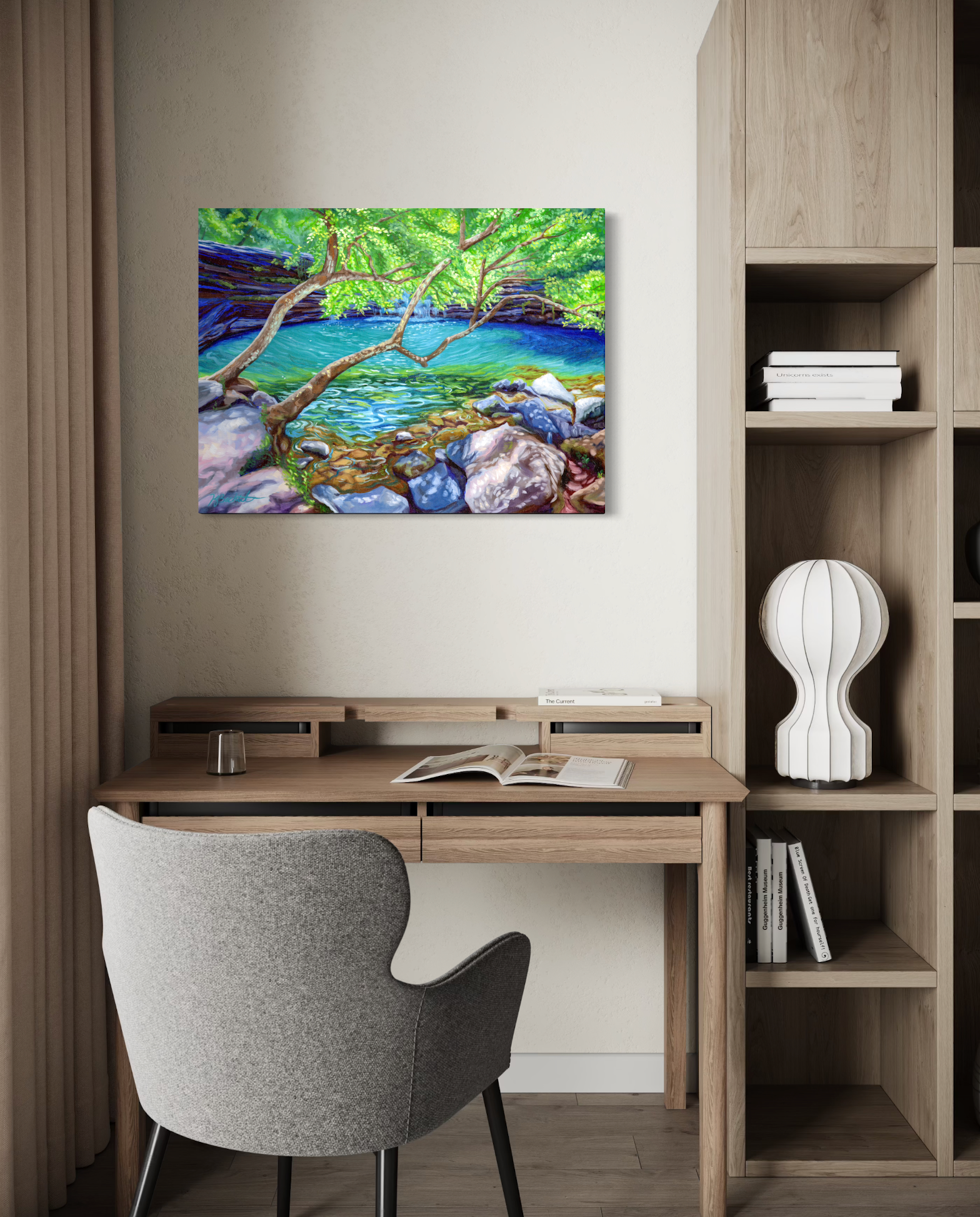 Home office with a desk, chair, and wall art of a nature scene.