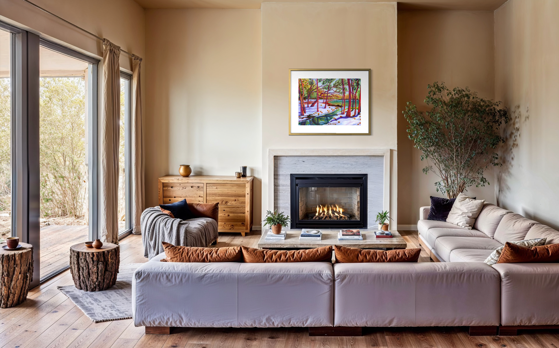 Modern living room with a fireplace, sofa, and decorative items. A painting of a snowy forest scene is framed on the wall. 