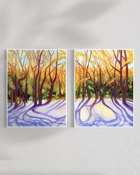 Two paintings of a forest scene with sunlight filtering through the trees on a white wall.