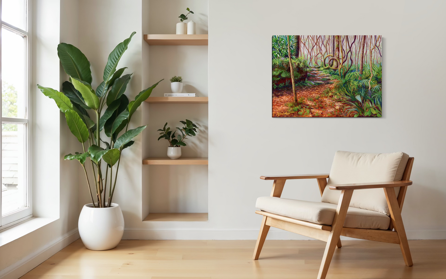 Modern interior with a chair, plant, and wall art of a forest scene.